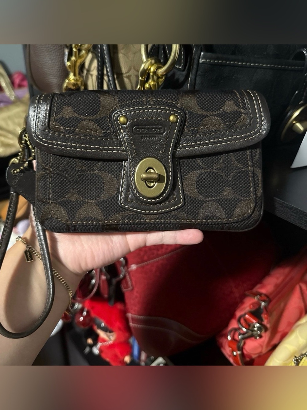Chocolate legacy lined coach wristlet